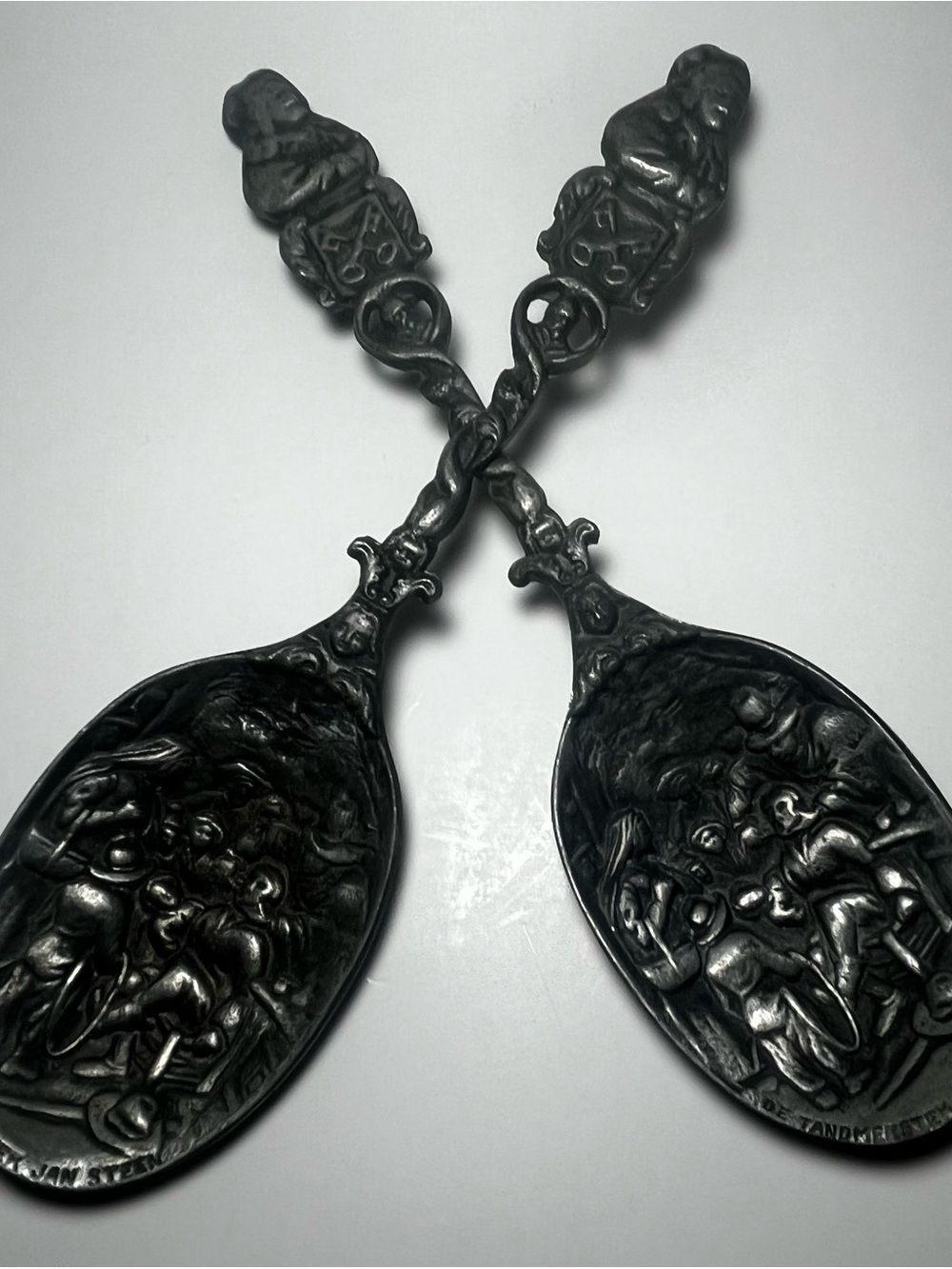 Dutch Pewter Ornate Relief Decorative Spoons - Pair